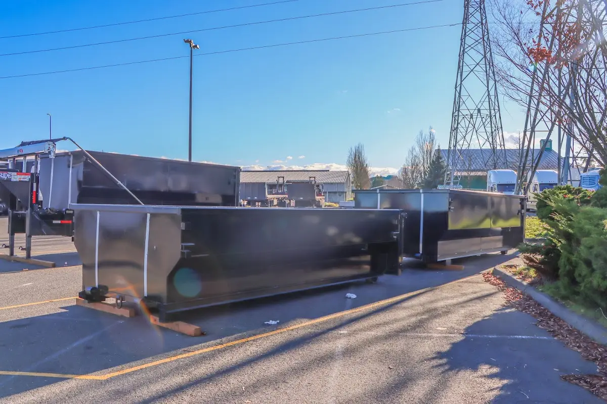 Roll-off dumpster ready for waste disposal at job site for 6 Yard Dumpster Rental in Oxford